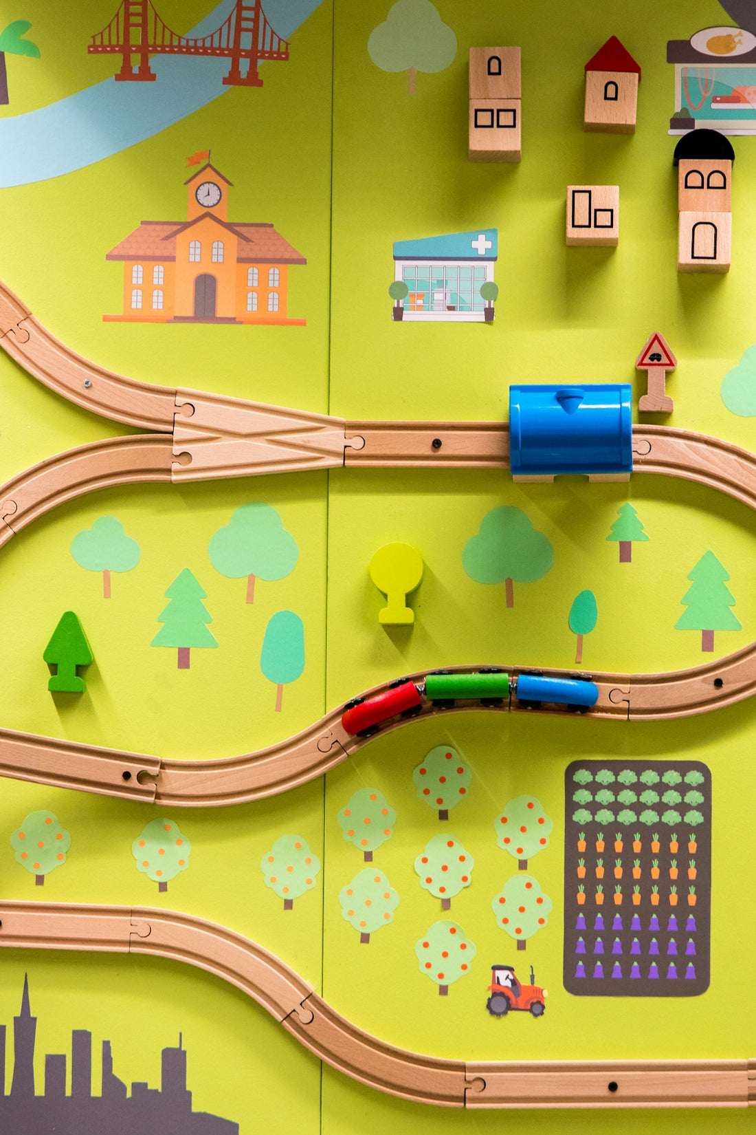 brown and multicolored train toy set