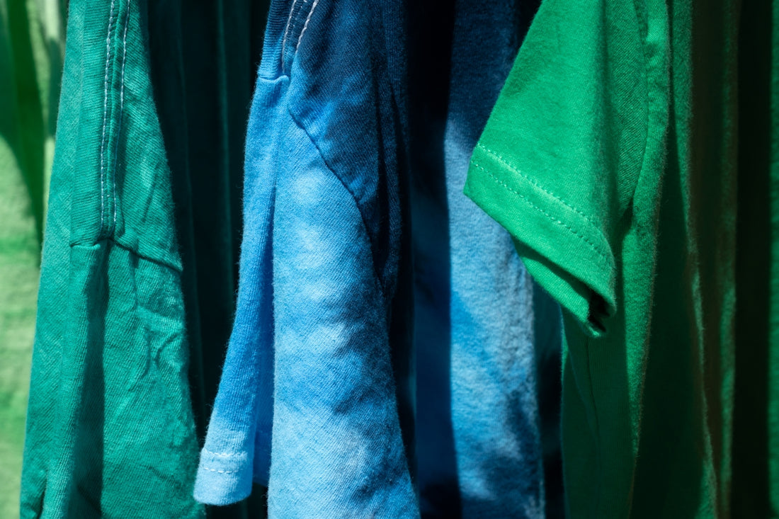 blue and green stripe textile