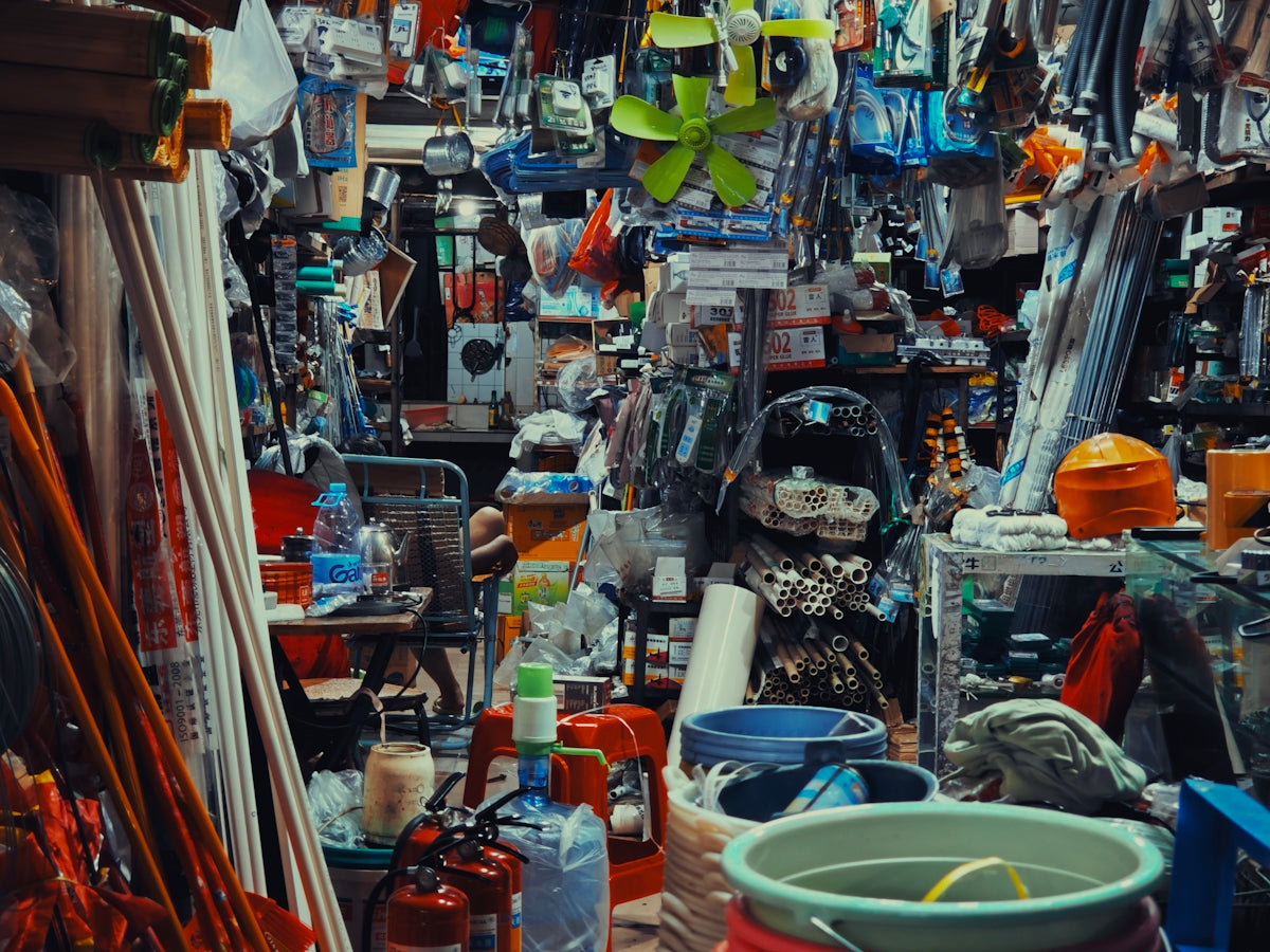 a room filled with lots of clutter and bottles