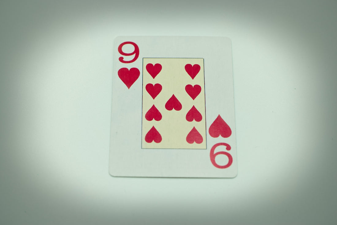 a playing card with hearts on it