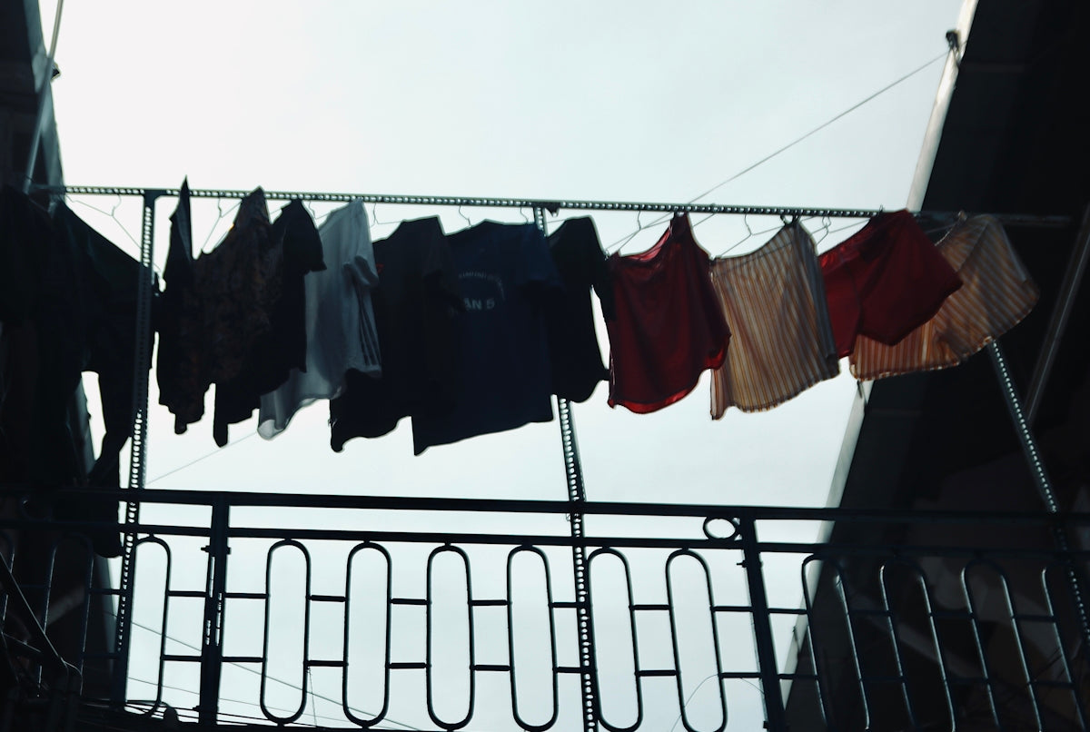A bunch of clothes hanging on a clothes line