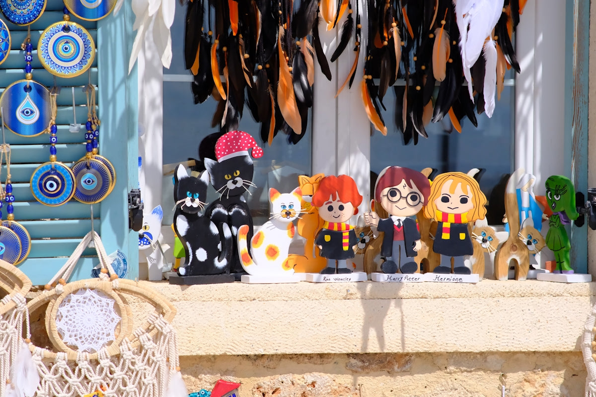 Souvenirs and decorations are displayed in a window.