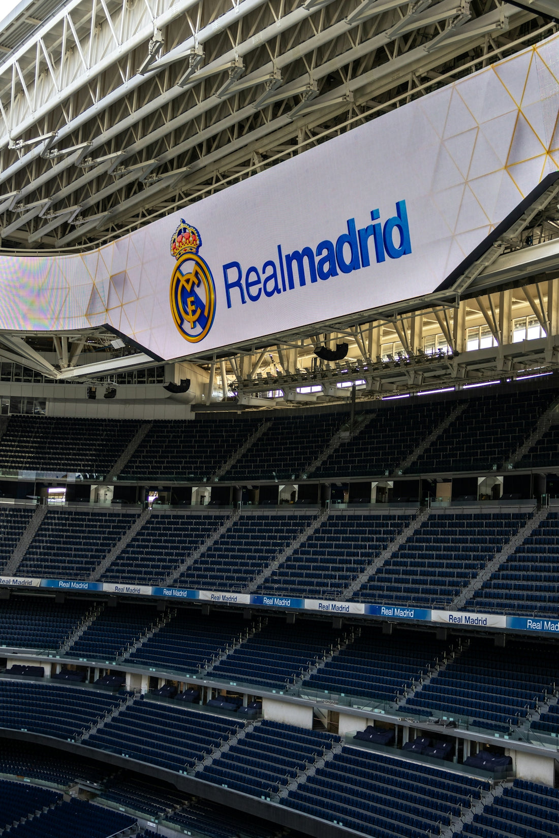 Real madrid's stadium with their logo.