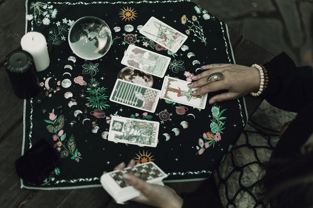 Tarot cards and crystals are used for divination.